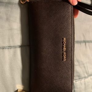 Black Micheal kors wallet.  Brand new.  Never used